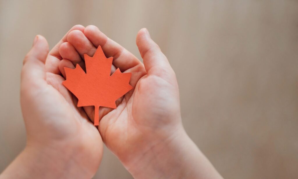 Maple Leaf in children's hands Canada