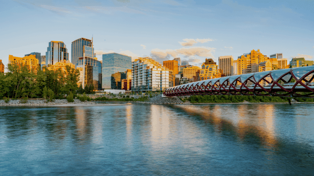 Calgary skyline with the Peace Bridge over the Bow River representing Alberta’s growing business startup hub for entrepreneurs in 2025