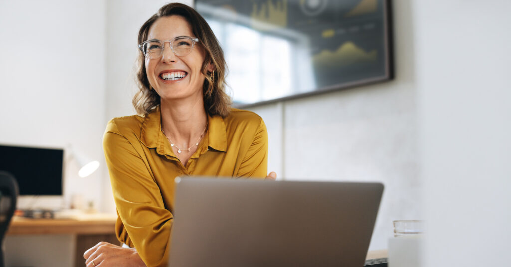 Woman Applying to PNP Canada with positive attitude.