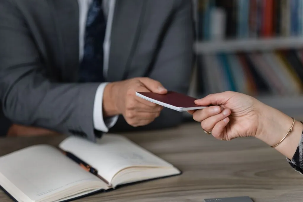 A professional immigration lawyer at a Canadian law firm consults with a foreign entrepreneur interested in immigrating to Saskatchewan through the Saskatchewan Immigrant Nominee Program (SINP), specifically under the entrepreneur category. The entrepreneur, who has a valid work permit and previous business experience, is preparing documents to meet the SINP eligibility criteria, including language requirements, proof of investment, and a detailed business plan. The law firm provides guidance on navigating the provincial nominee program, ensuring alignment with Saskatchewan’s economic priorities and addressing labour shortages in certain sectors. This image reflects the critical role of legal services in helping skilled foreign nationals and international graduates successfully transition to permanent residence and contribute to Saskatchewan’s economy and workforce.