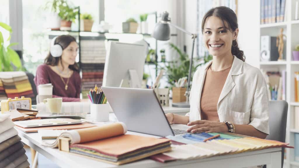 Self-employed professional preparing detailed business plan for C11 work permit application to start her own business in Canada and create local jobs